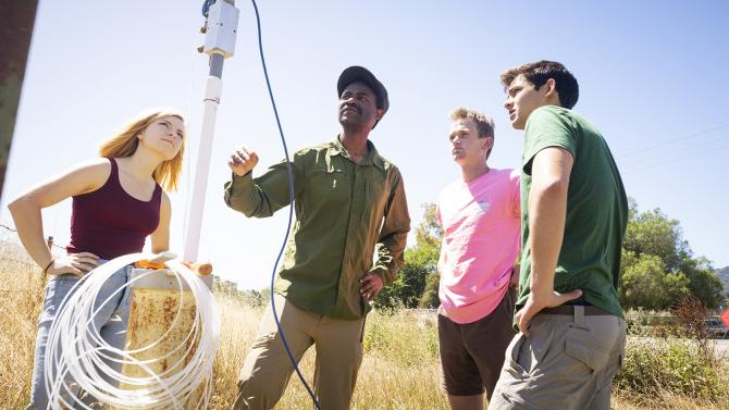 With Dr. Bwalya Malama and students monitoring a well on campus.